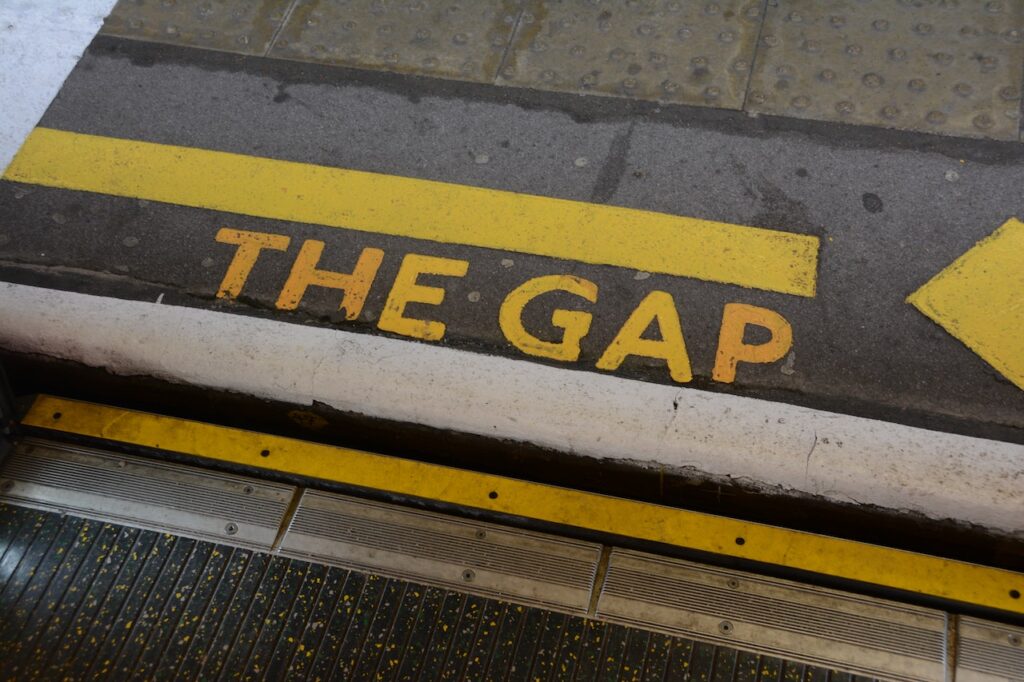 A subway train sign that reads "the gap."